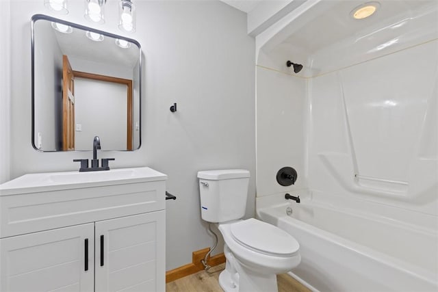 full bathroom featuring vanity, shower / bathing tub combination, wood-type flooring, and toilet