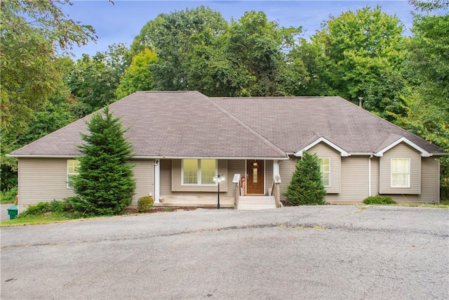 single story home featuring a porch