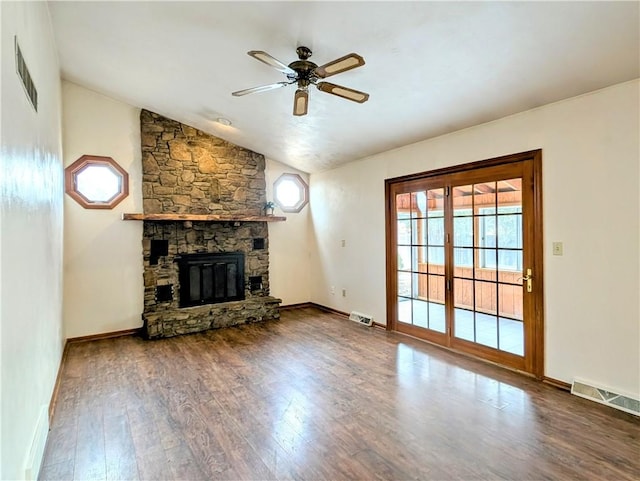 unfurnished living room with vaulted ceiling, ceiling fan, a fireplace, and hardwood / wood-style floors