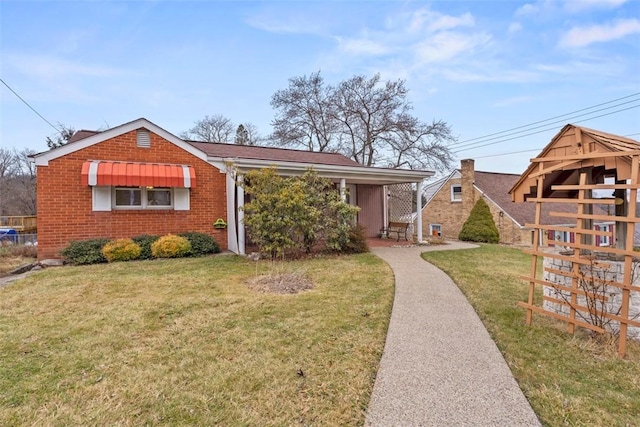 view of front of house with a front lawn