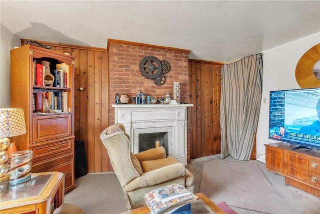 carpeted living room with wooden walls