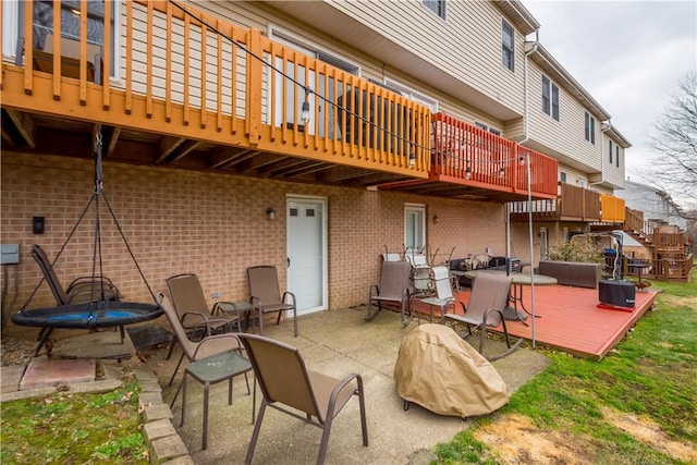 view of patio / terrace with a wooden deck