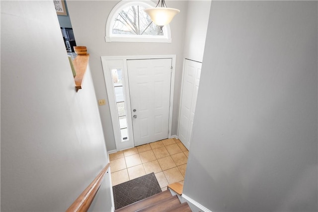 view of tiled foyer entrance