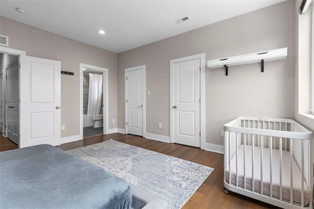 bedroom featuring dark wood-type flooring