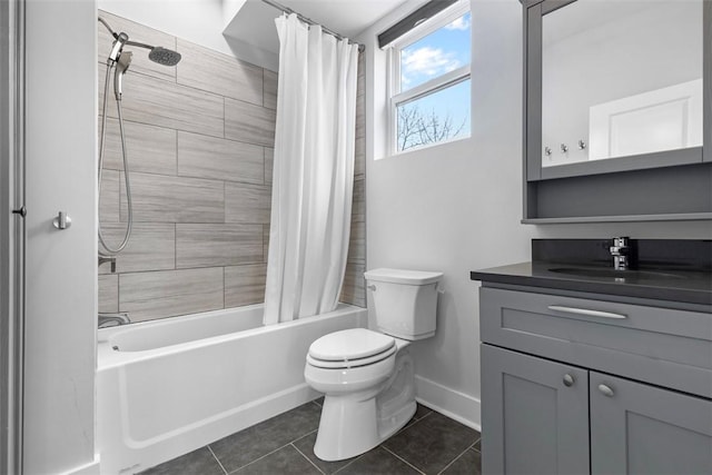 full bathroom featuring tile patterned flooring, vanity, toilet, and shower / bath combo