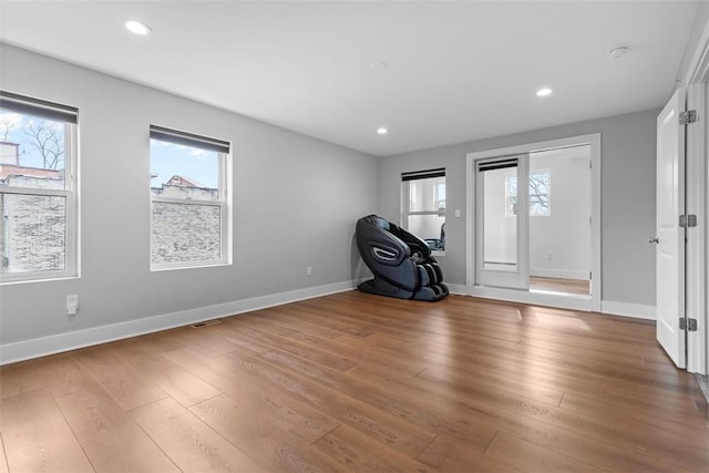 entryway with hardwood / wood-style flooring