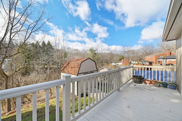 wooden terrace with a water view