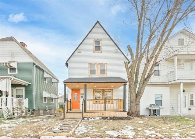 view of front of property featuring covered porch