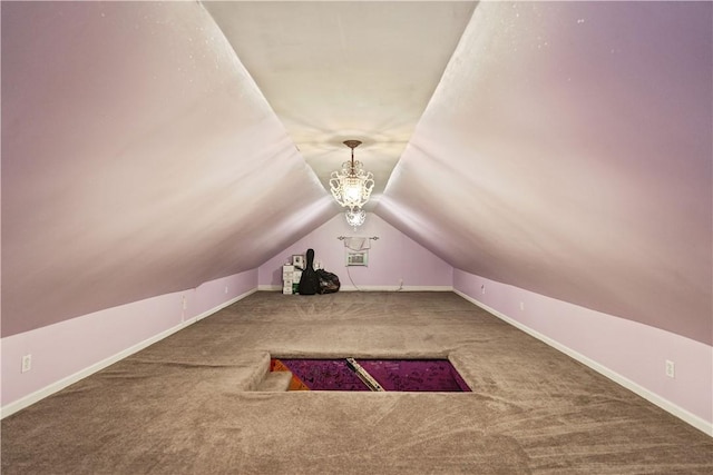 bonus room with an inviting chandelier, lofted ceiling, and carpet floors