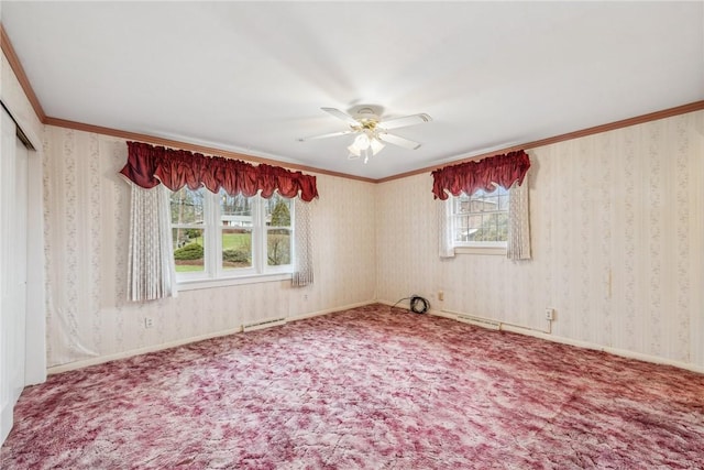 spare room featuring ceiling fan, a healthy amount of sunlight, and carpet