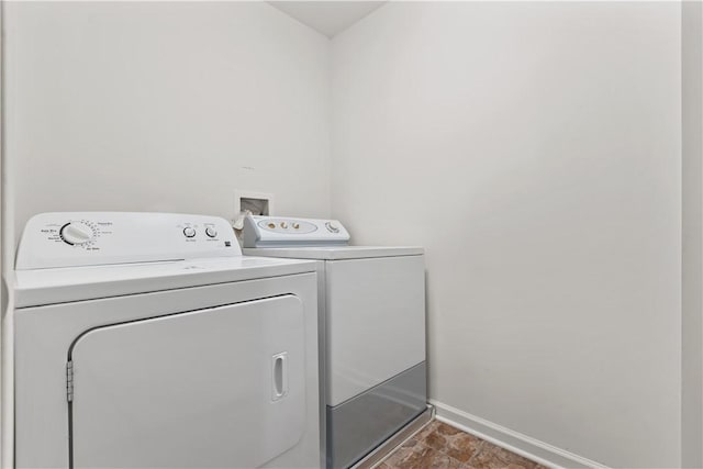 laundry area featuring washing machine and dryer