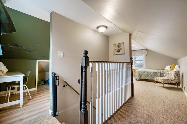 interior space featuring vaulted ceiling and light wood-type flooring