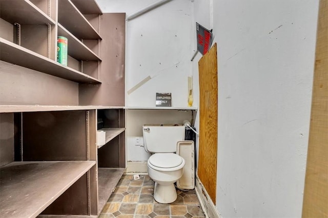 bathroom featuring toilet