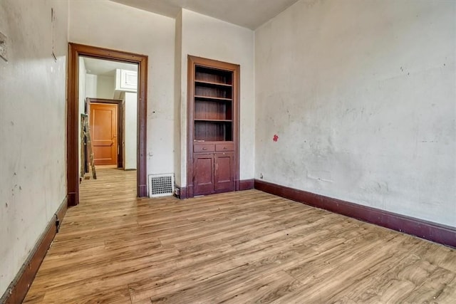 unfurnished bedroom with light hardwood / wood-style floors