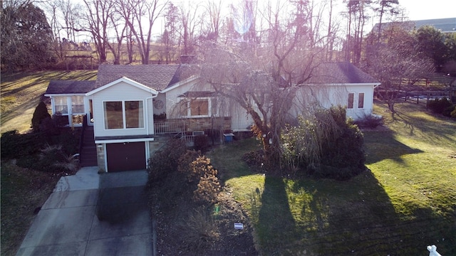 115 Lakeview Dr, Center Twp But, PA 16001 - view of front facade with concrete driveway and an attached garage