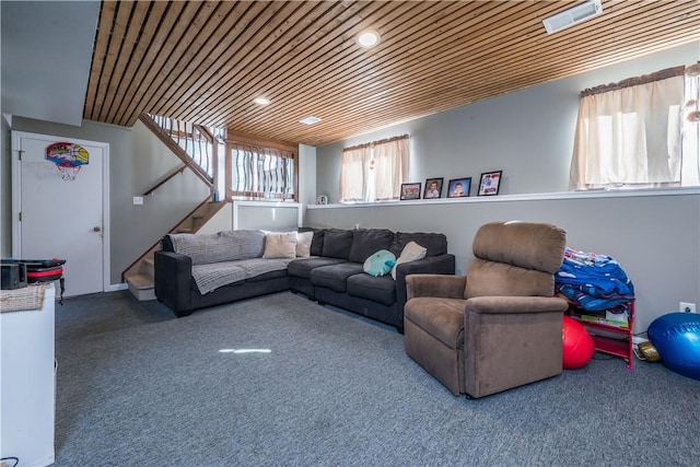 living room with wooden ceiling and carpet