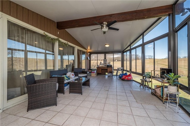 sunroom featuring vaulted ceiling with beams and ceiling fan