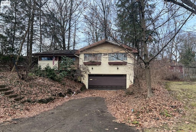 view of front of home with a garage