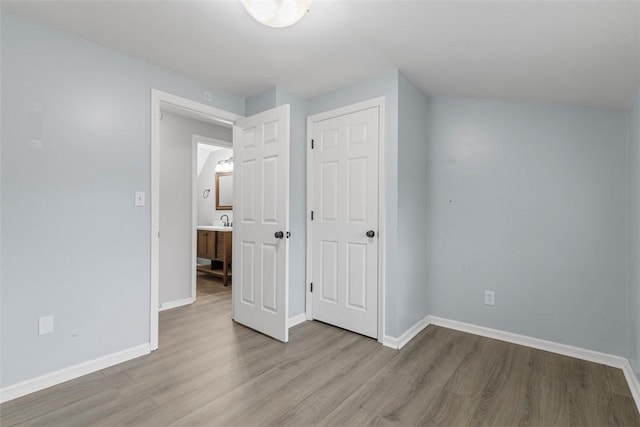 unfurnished bedroom with light hardwood / wood-style flooring