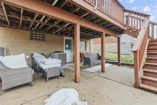 view of patio featuring an outdoor living space and central AC unit