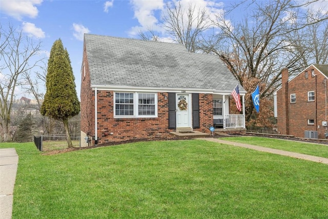 view of front of property featuring a front lawn and covered porch