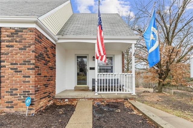 property entrance with covered porch