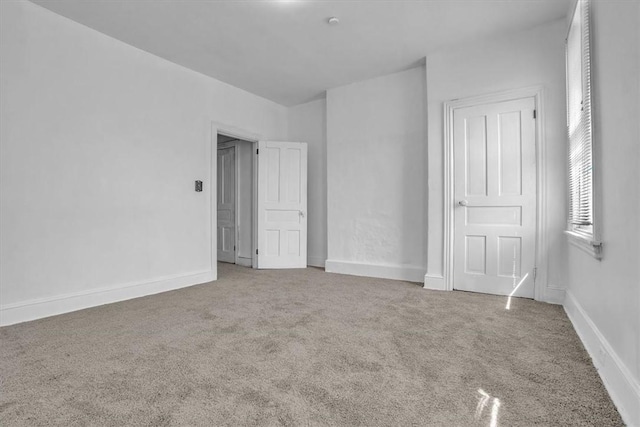 empty room with carpet floors