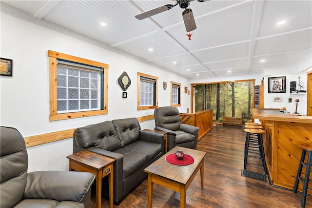 living room featuring coffered ceiling, ceiling fan, bar area, and dark hardwood / wood-style floors