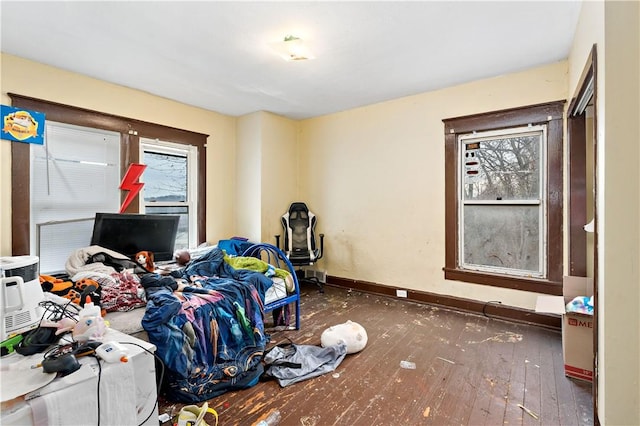 bedroom featuring dark hardwood / wood-style flooring