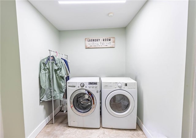 laundry room with washer and dryer