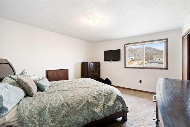 bedroom featuring carpet