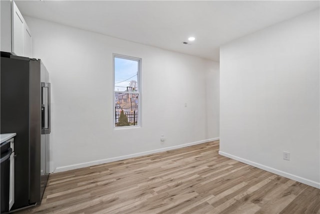 interior space with light hardwood / wood-style floors