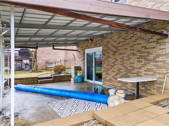 view of swimming pool with a patio