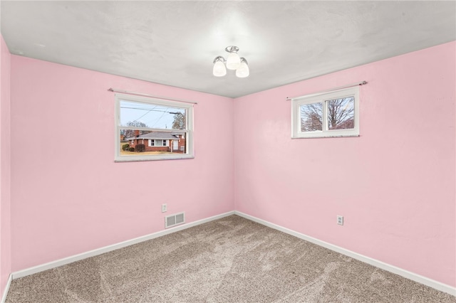 view of carpeted spare room