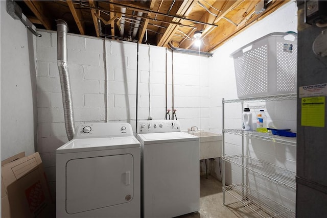 laundry room featuring washer and clothes dryer