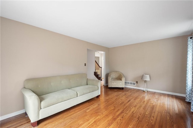 living room with hardwood / wood-style flooring