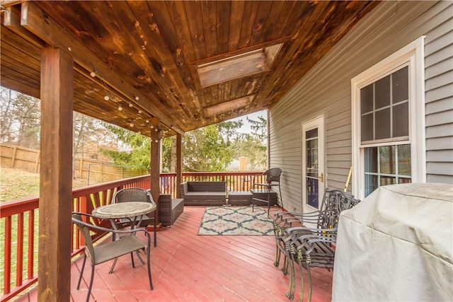 deck featuring an outdoor living space