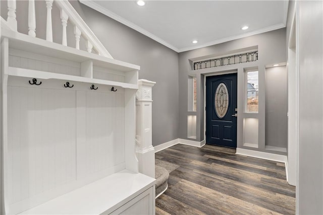 mudroom with dark hardwood / wood-style flooring and ornamental molding