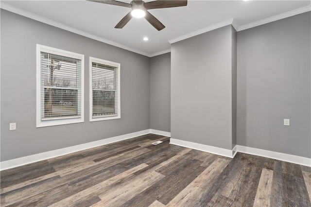 empty room with crown molding, dark hardwood / wood-style floors, and ceiling fan