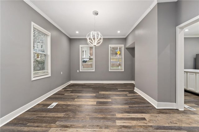 unfurnished dining area featuring crown molding, a notable chandelier, and dark hardwood / wood-style flooring