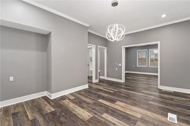 unfurnished dining area with crown molding, dark hardwood / wood-style floors, and a notable chandelier