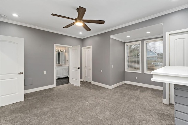 unfurnished bedroom with ensuite bath, ornamental molding, ceiling fan, and carpet flooring