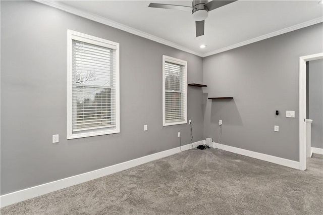 washroom featuring crown molding, ceiling fan, and carpet