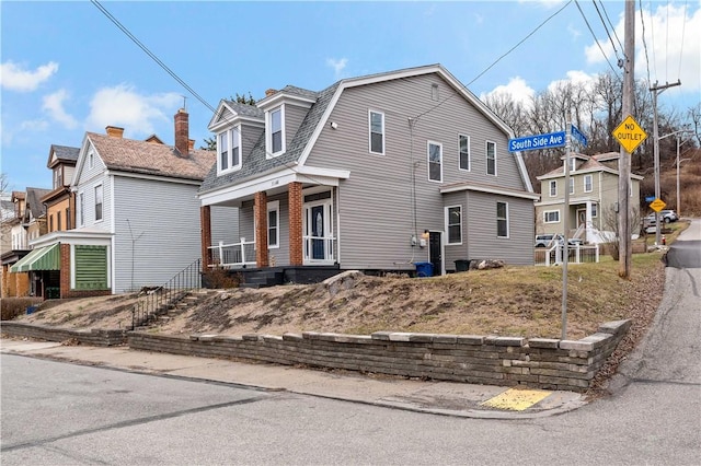 view of front of home featuring covered porch