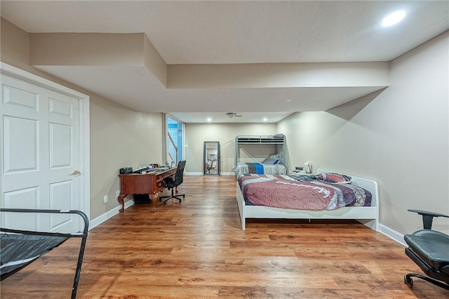 bedroom with light hardwood / wood-style floors