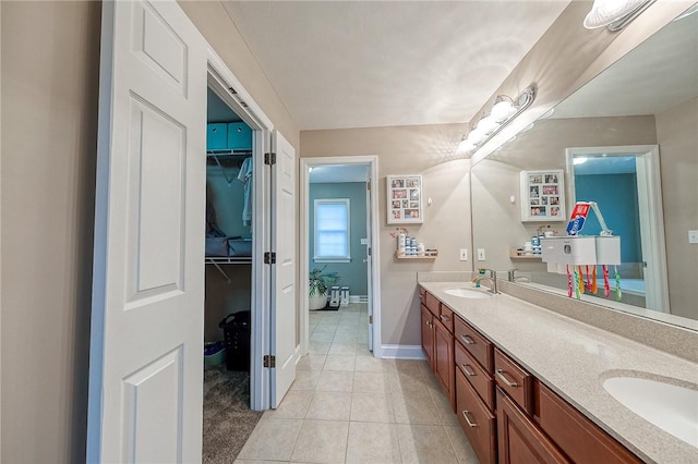 bathroom featuring vanity and tile patterned flooring