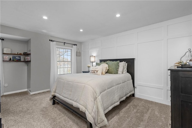 bedroom featuring light carpet