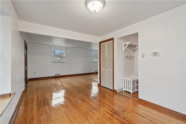 spare room featuring hardwood / wood-style flooring