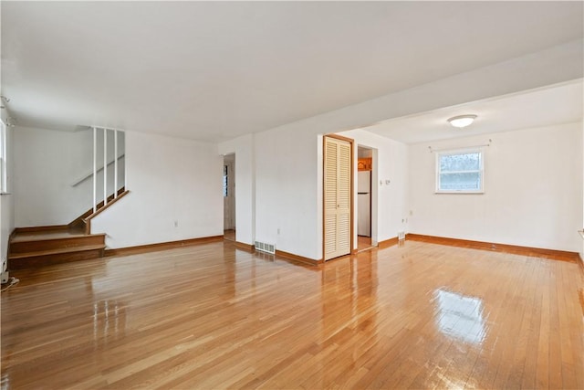 empty room featuring wood-type flooring