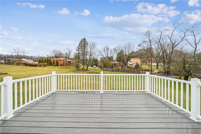 wooden deck with a yard